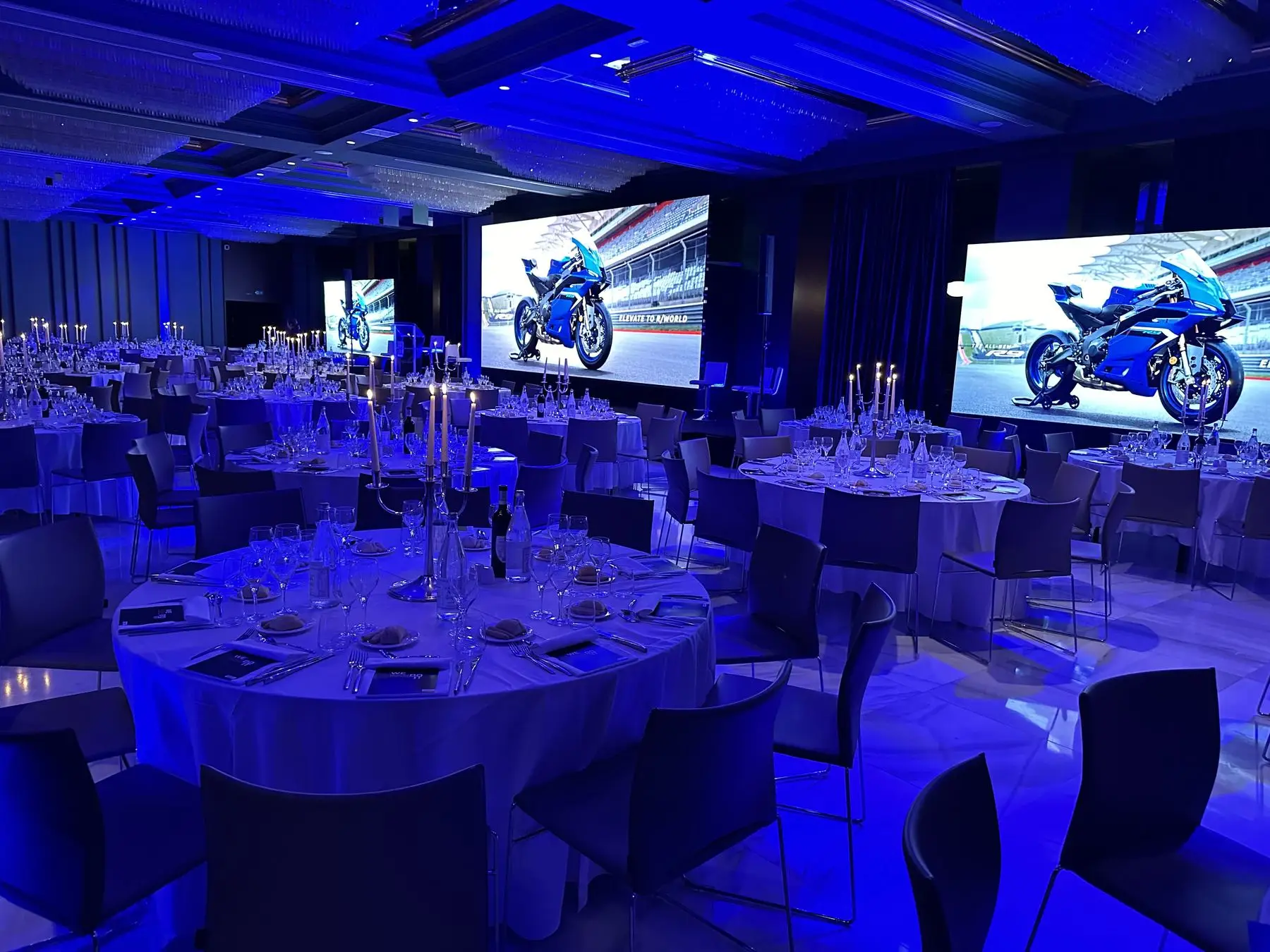 Gala dinner in blue light with LED walls